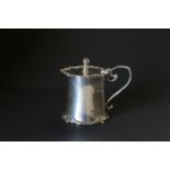 Edwardian silver mustard pot of concave circular shape with shaped edges by Jackson & Fullerton,