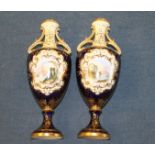 Pair of early 20th century Coalport two handled tall baluster "shield shape" vases,