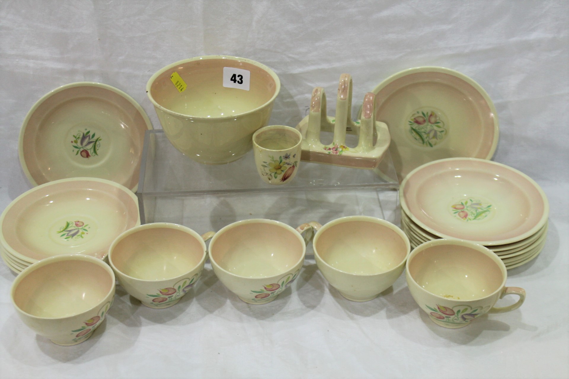 Twenty-Two piece Susie Cooper part tea set, pink tones and flower spray design including cups,