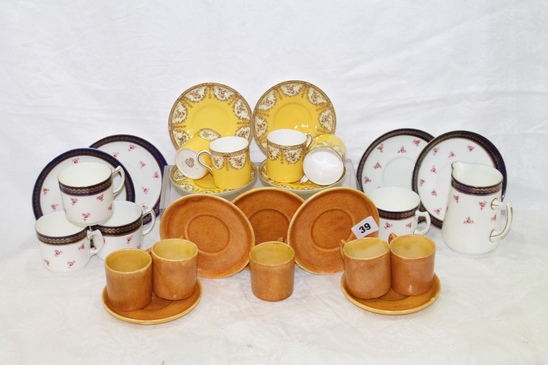 Royal Worcester yellow and gilt eight piece cabinet cup and saucer set.