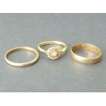 Two 18ct gold band rings and another gem set (3).