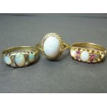 Garnet and opal ring in 18ct gold, 1902 and two others, 9ct. (3).