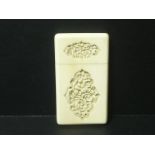 Chinese ivory small card case with shaped carved panels. C1880. 85mm x 47mm.