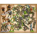 Britain's. Collection of various plastic WWII soldiers. Metal & plastic bases.