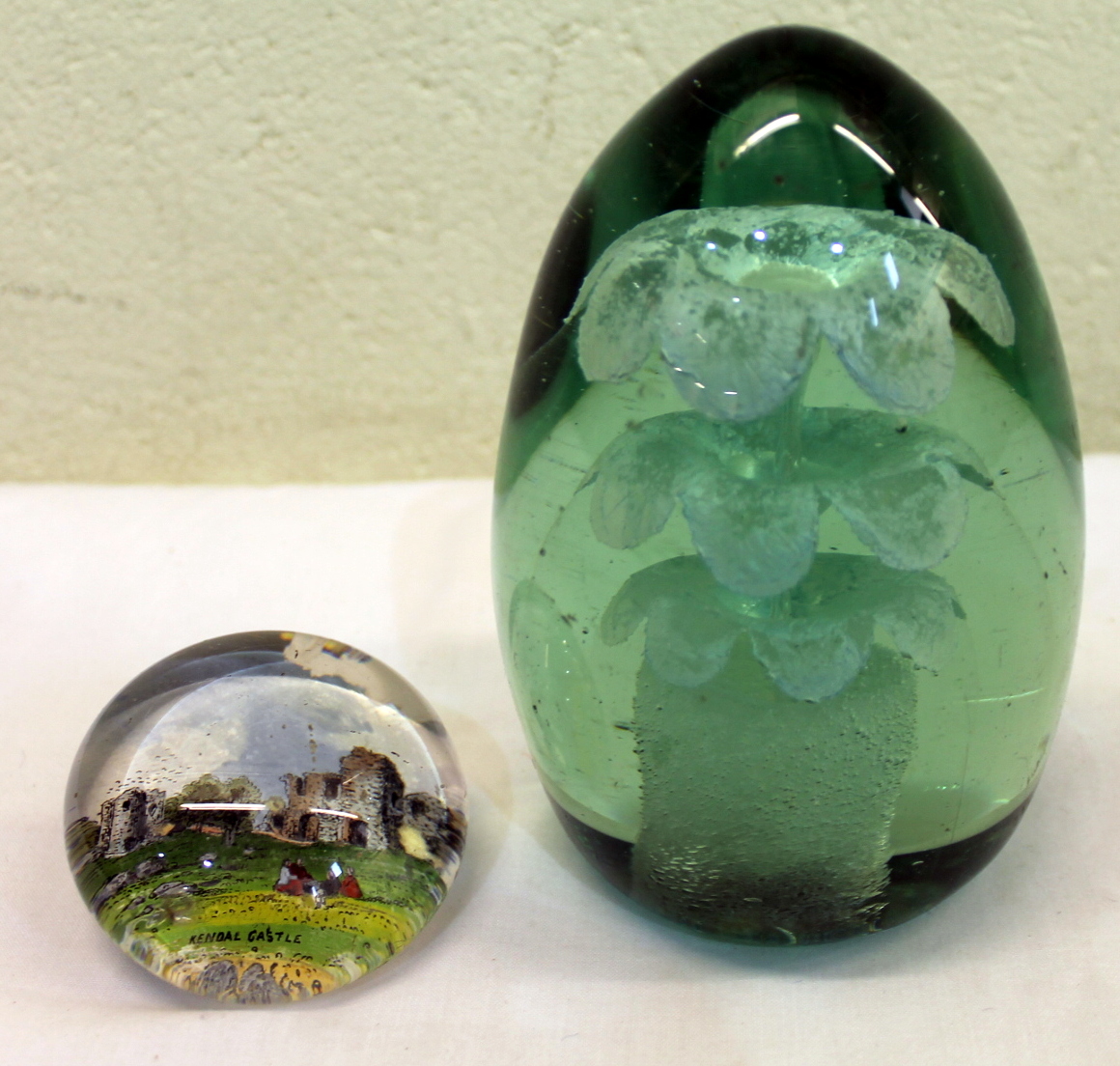 Green glass dump paperweight of ovoid form,