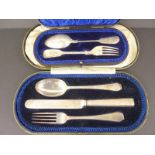 Silver knife, fork and spoon, 1916 and a spoon and fork, engraved and cased.