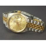 Rolex Oyster perpetual date watch R301565 rolled gold and stainless steel;