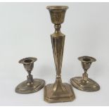 Pair of silver dwarf candlesticks of navette section and another, taller, loaded.