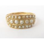 Victorian gold ring with three rows of pearls in 15ct gold, Chester, circa 1890.