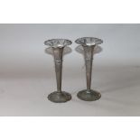 Pair of silver vases, octagonal with pierced rims by C.C. Pilling, 1901, 20cm.