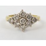 Diamond navette cluster ring with nine brilliants in 18ct gold.