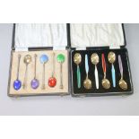 Set of six Norwegian silver gilt and polychrome enamelled coffee spoons and another set with