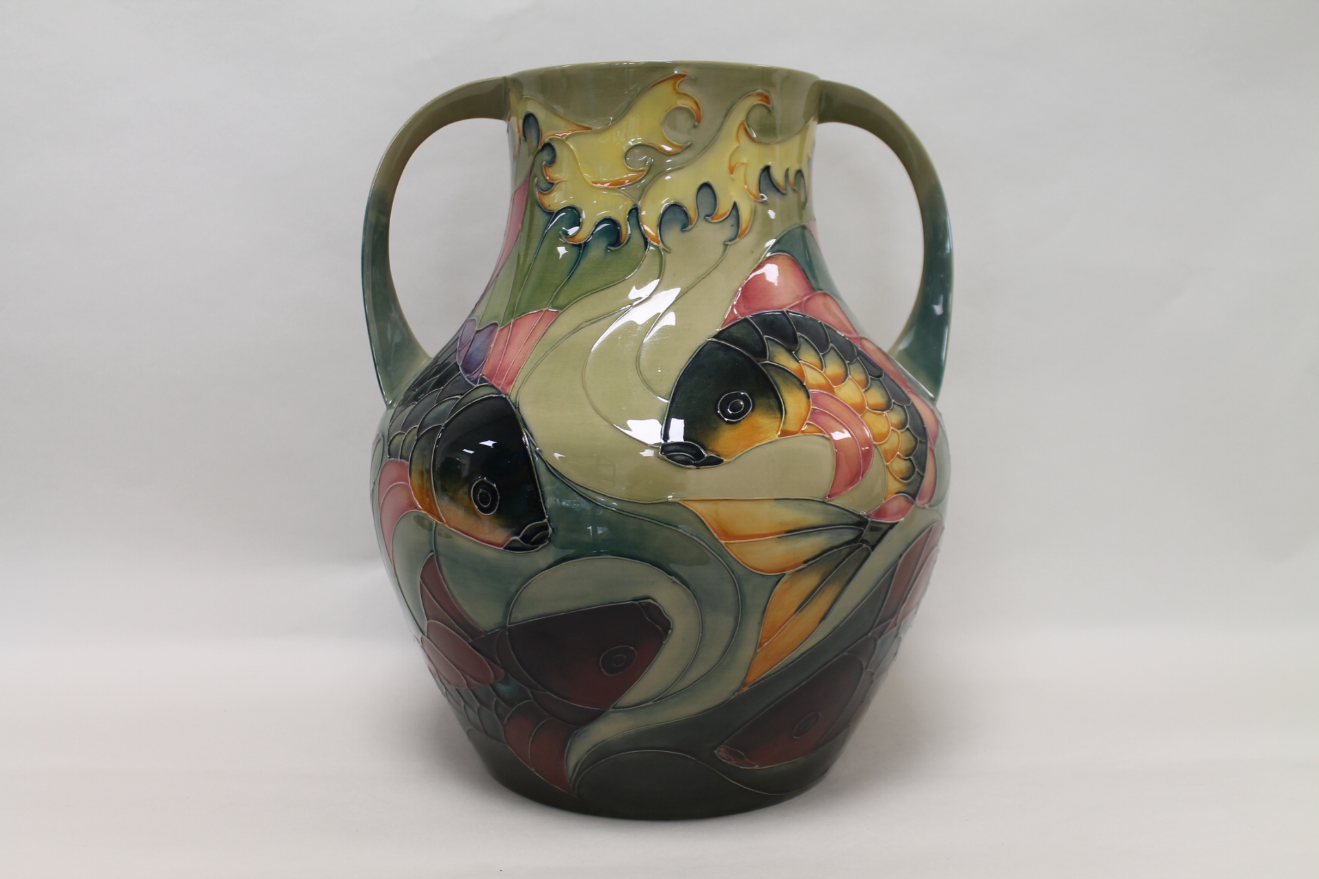 Large Moorcroft Pottery twin handled "Carp" pattern vase designed by Sally Tuffin,