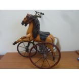 Vintage metal "Mobo Bronco" tin plate mechanical horse.