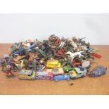 Various die-cast vehicles, lead cowboy and Indians and a quantity of plastic army and other figures.