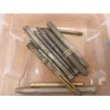 Ten mechanical pencils including silver.