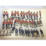 Early 20th century military lead figures, various regiments including navy blue jackets,