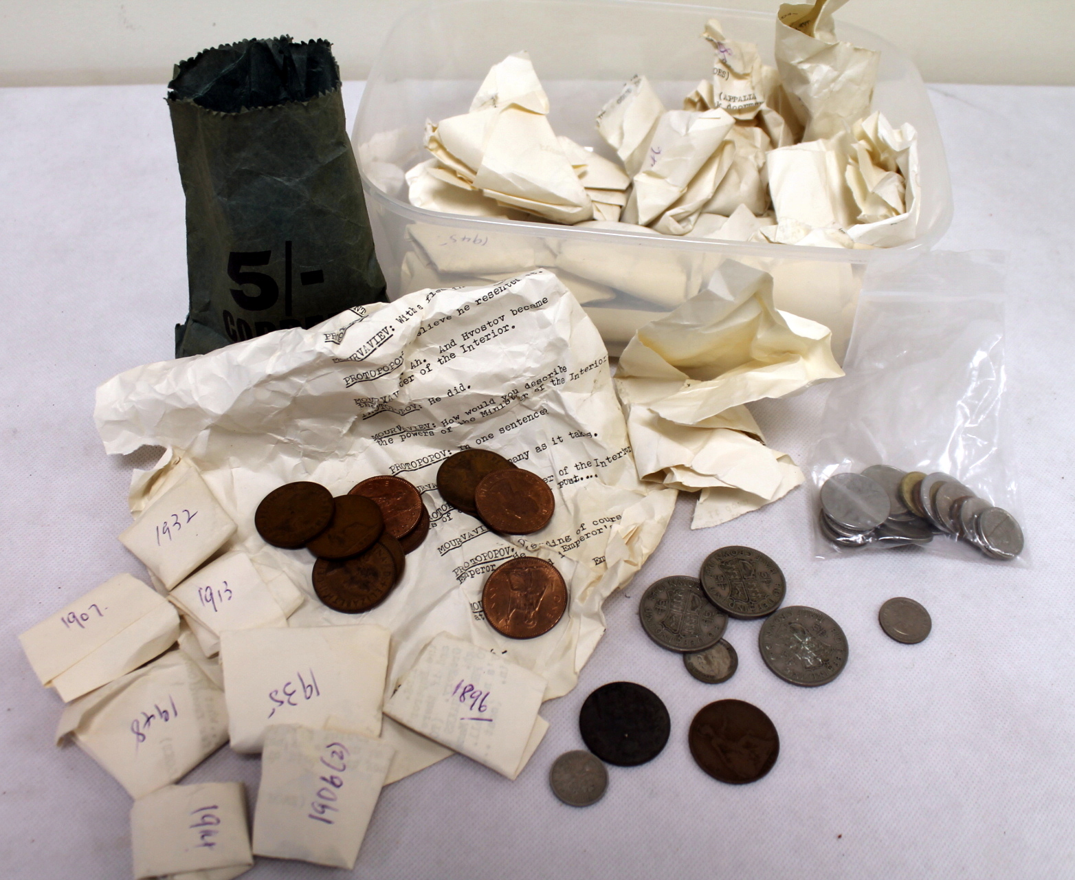 Collection of various coins, mainly 20th century pennies.