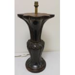 Bronzed table lamp in the form of an archaic Oriental vase. 21" high. Condition Report.