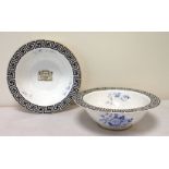 Pair of Royal Worcester bowls with armorial shield, blue floral sprigging and Greek key border.