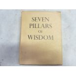 LAWRENCE T. E. Seven Pillars of Wisdom. Illus. & maps. Quarto. Orig. cloth in d.w. 1936.