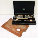 Winsor and Newton artist's black japanned paint box and a palette, 12½" long.