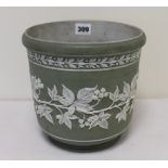 Green and white jasper ware jardiniere with foliate decoration.