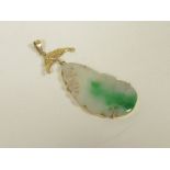 Jadeite pendant, variated greens in gold mount, modelled as a bat. "585".