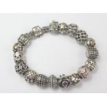 Pandora bracelet with silver charms.