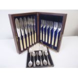 Set of six e.p. fish knives and six forks and a set of six silver coffee spoons, both cased.
