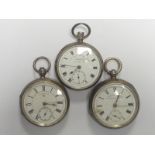 Three lever watches in open face silver cases.