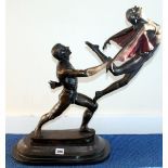 Modern bronze figure group of two dancers mounted on oval black marble plinth base, 60cm high.