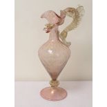 Large Venetian glass ewer of baluster form, with trefoil rim, domed foot,