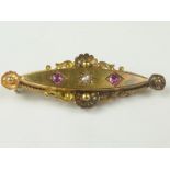 Victorian gold brooch with diamond and two rubies and beaded sunflowers.