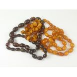 Three amber bead necklaces.