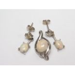 Pair of drop earrings each with an opal and diamond brilliant, 9ct white gold,