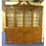 20th century satinwood breakfront library bookcase in the George III Sheraton Style,