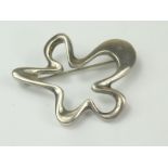 Georg Jensen silver brooch of open looped pentagonal form, import marks, 1979.