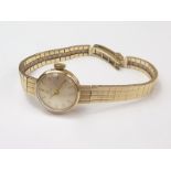 Lady's Tissot 9ct gold bracelet watch, manual. Condition Report.