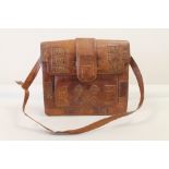 Vintage tan leather handbag with inset alligator skin panels, shoulder strap and flap top,