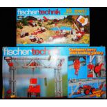 Fischertechnik. 50+Mot 1 basic set. Also container lorry with loading gantry. Both boxed.