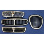 Motoring. Four radiator grills including Rover and Jaguar.