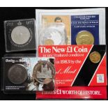 Small collection of various coins and medallions. Mostly packaged.