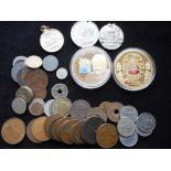 Small collection of various coins and medallions.