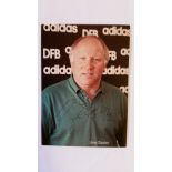 FOOTBALL, signed colour postcard by Uwe Seeler, in green polo shirt, EX