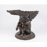 Bronze Seated Angel Resting Under His Wings