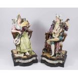 Pair of Majolica Seated Figures