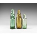 Antique Victorian Amber and Blue Codd and Lamonts Bottles Group