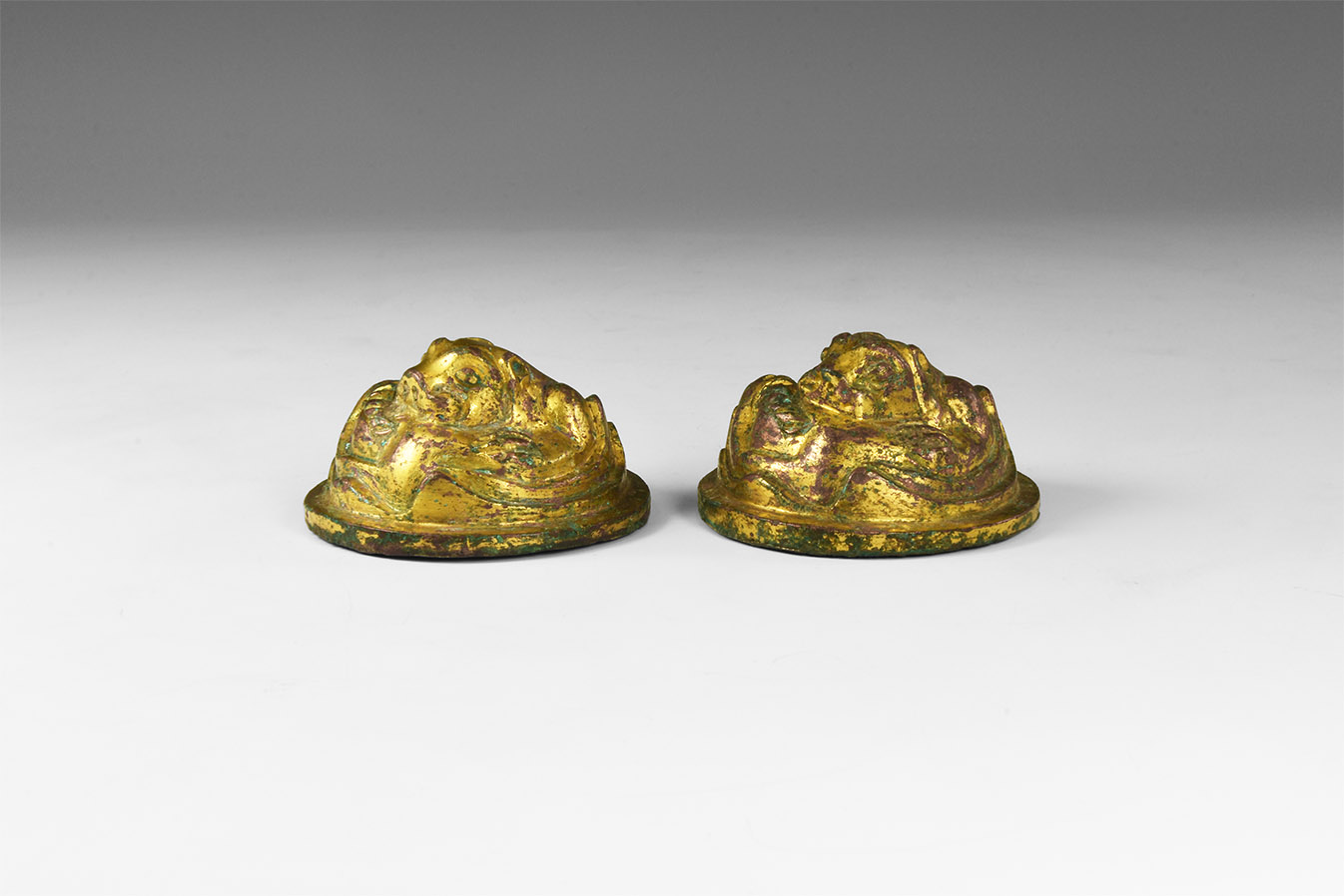 Chinese Han Gilt Lion Scroll Weight Pair
