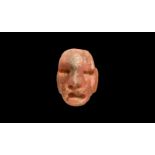 Pre-Columbian Carved Ruby Mask